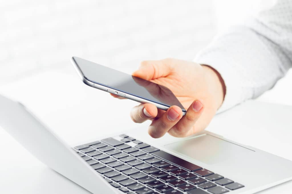 website performance concept with responsive website on laptop and mobile phone