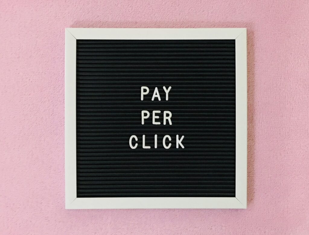 Peg board with Pay per click on it (PPC concept)